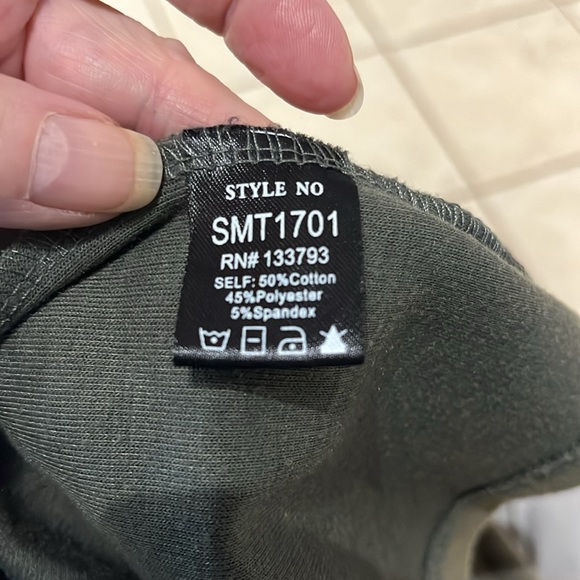 Sleeveless ribbed dress with ruffles at shoulders, skirt is partially lined. - Picture 6 of 6